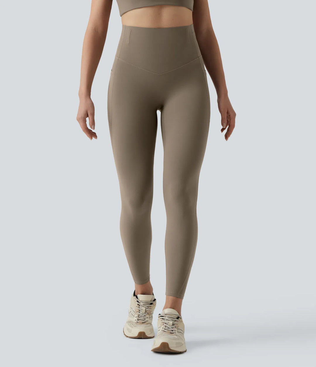 Halara UltraSculpt legginsy do jogi 7/8 z wysokim stanem, modelowaniem i kontrolą brzucha, pasem zapobiegającym podwijaniu oraz kieszeniami