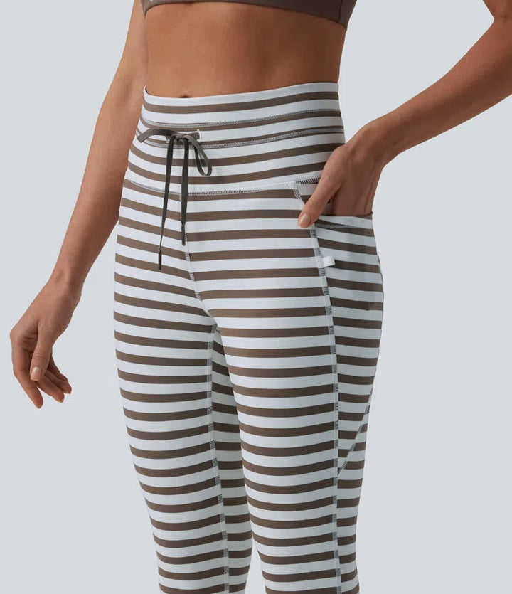 Wysokie legginsy do jogi w paski z sznurkiem w pasie i kieszeniami