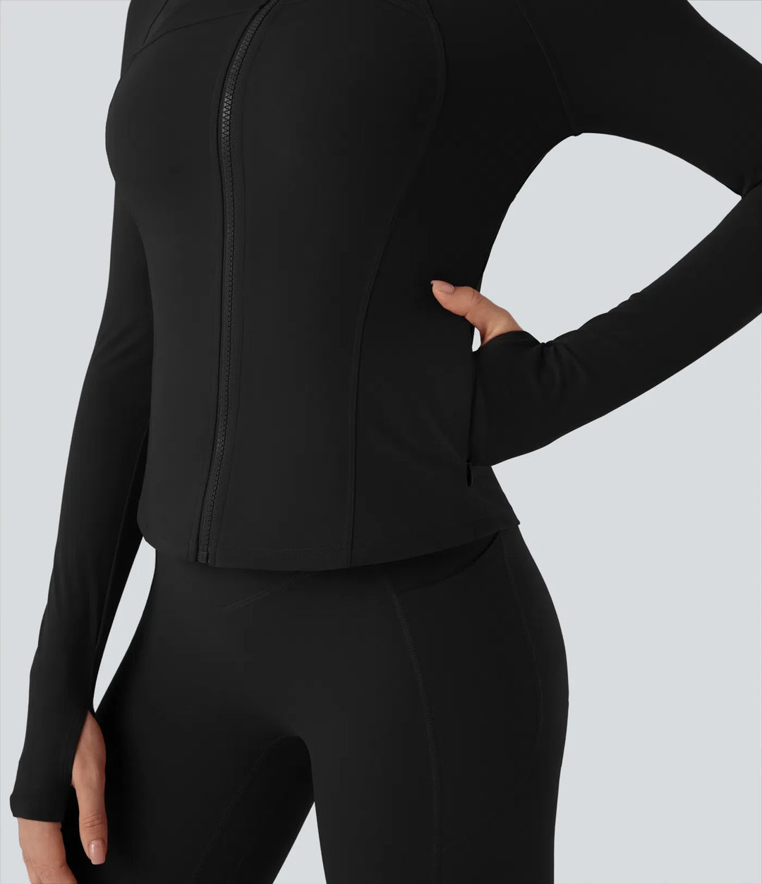 Milejka UltraSculpt ze stójką i długim rękawem z otworem na kciuk joga Curvy kurtka z kieszeniami