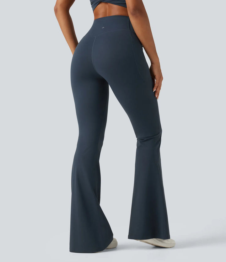Halara UltraSculpt legginsy treningowe z wysokim, skrzyżowanym stanem, modelujące brzuch, z rozkloszowanymi nogawkami i kieszeniami