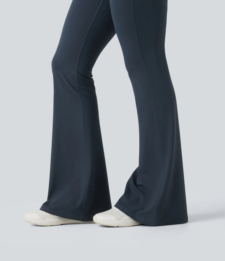 Halara UltraSculpt legginsy treningowe z wysokim, skrzyżowanym stanem, modelujące brzuch, z rozkloszowanymi nogawkami i kieszeniami
