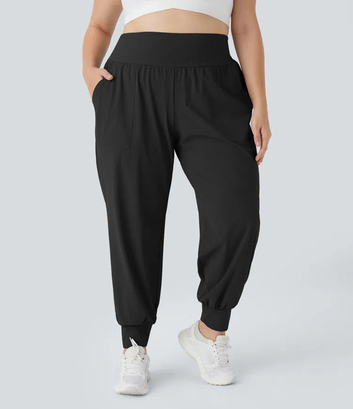 Joggery do jogi z wysokim stanem, w jednolitym kolorze, z kieszeniami, w rozmiarze plus