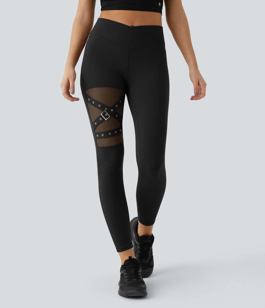 DayStretch legginsy do jogi z wysokim stanem, krzyżowanym przodem, kontrastową siateczką i ozdobną klamrą