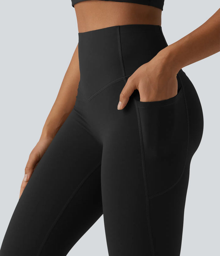 Halara UltraSculpt legginsy do jogi z wysokim stanem, unoszące pośladki i modelujące brzuch, o kroju bootcut, z kieszeniami