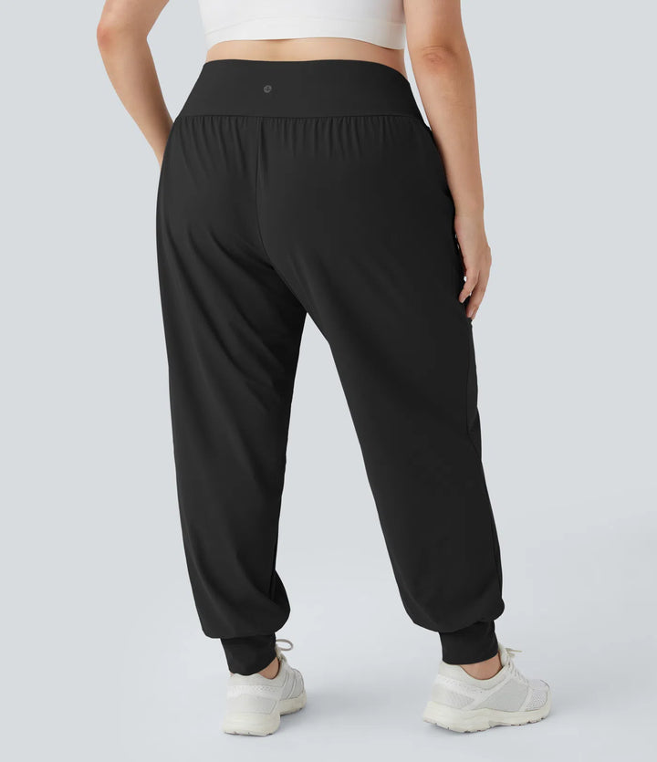 Joggery do jogi z wysokim stanem, w jednolitym kolorze, z kieszeniami, w rozmiarze plus