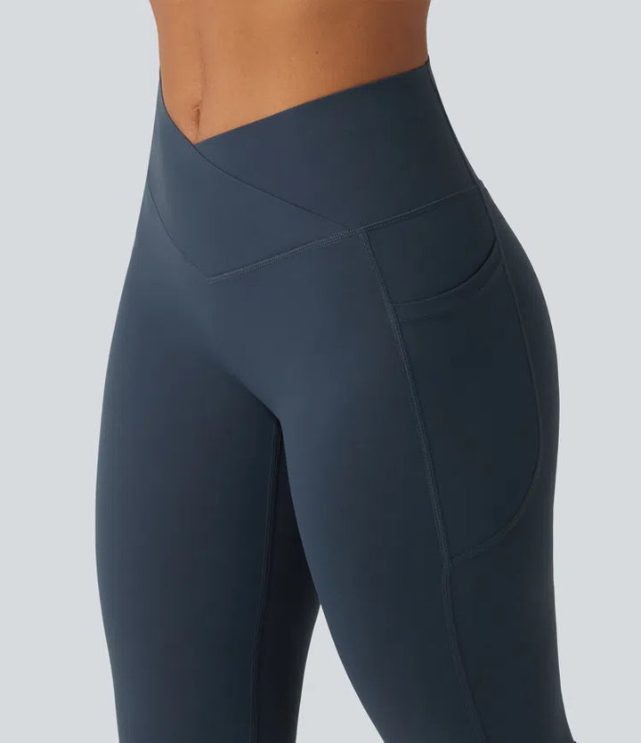 Halara UltraSculpt legginsy treningowe z wysokim, skrzyżowanym stanem, modelujące brzuch, z rozkloszowanymi nogawkami i kieszeniami