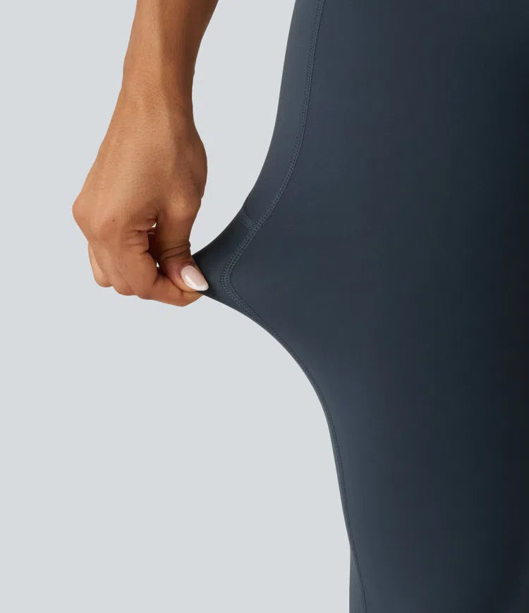 Halara UltraSculpt legginsy treningowe z wysokim, skrzyżowanym stanem, modelujące brzuch, z rozkloszowanymi nogawkami i kieszeniami