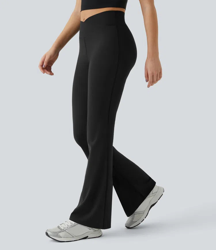 DayStretch legginsy do jogi z wysokim stanem, krzyżowanym pasem i rozszerzanymi nogawkami.