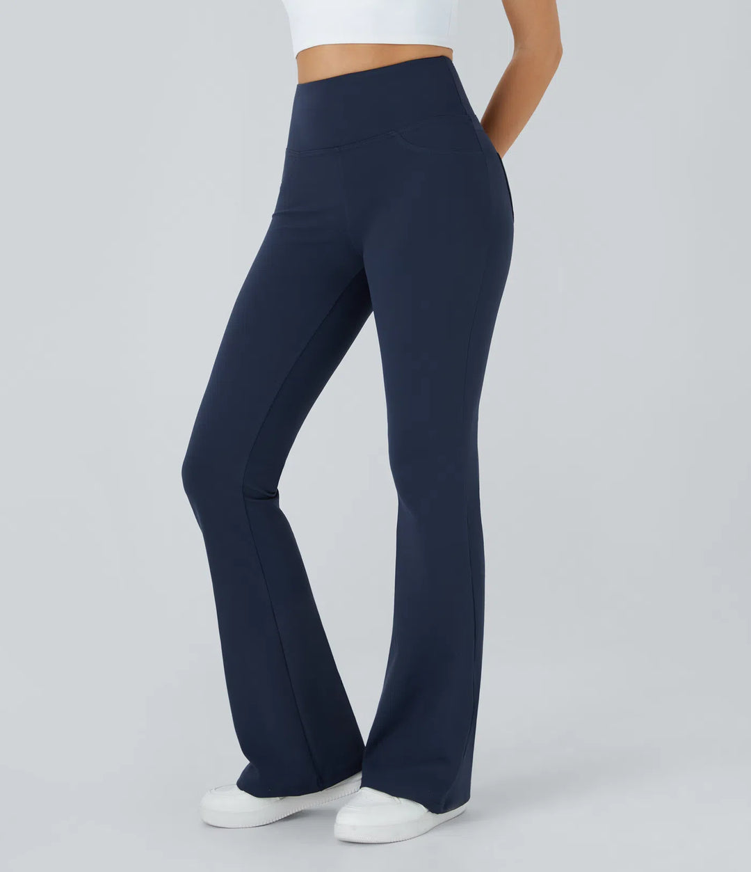DayStretch legginsy do jogi z wysokim stanem, kieszeniami i rozkloszowanymi nogawkami.