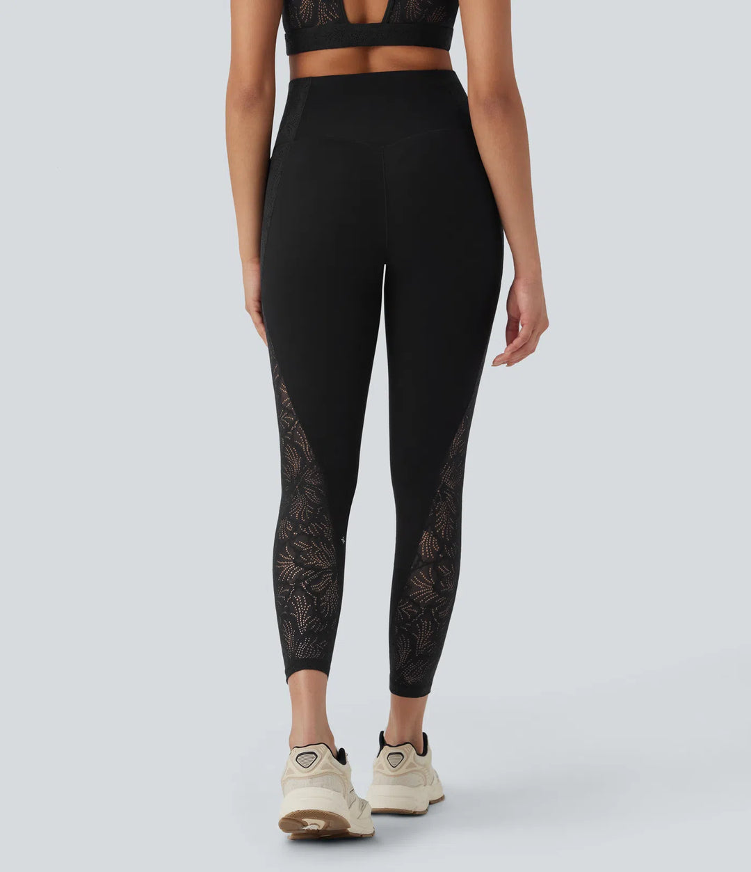 Halara UltraSculpt SoCinched legginsy treningowe o wysokim stanie, modelujące brzuch, z kontrastowymi koronkowymi detalami i kieszeniami