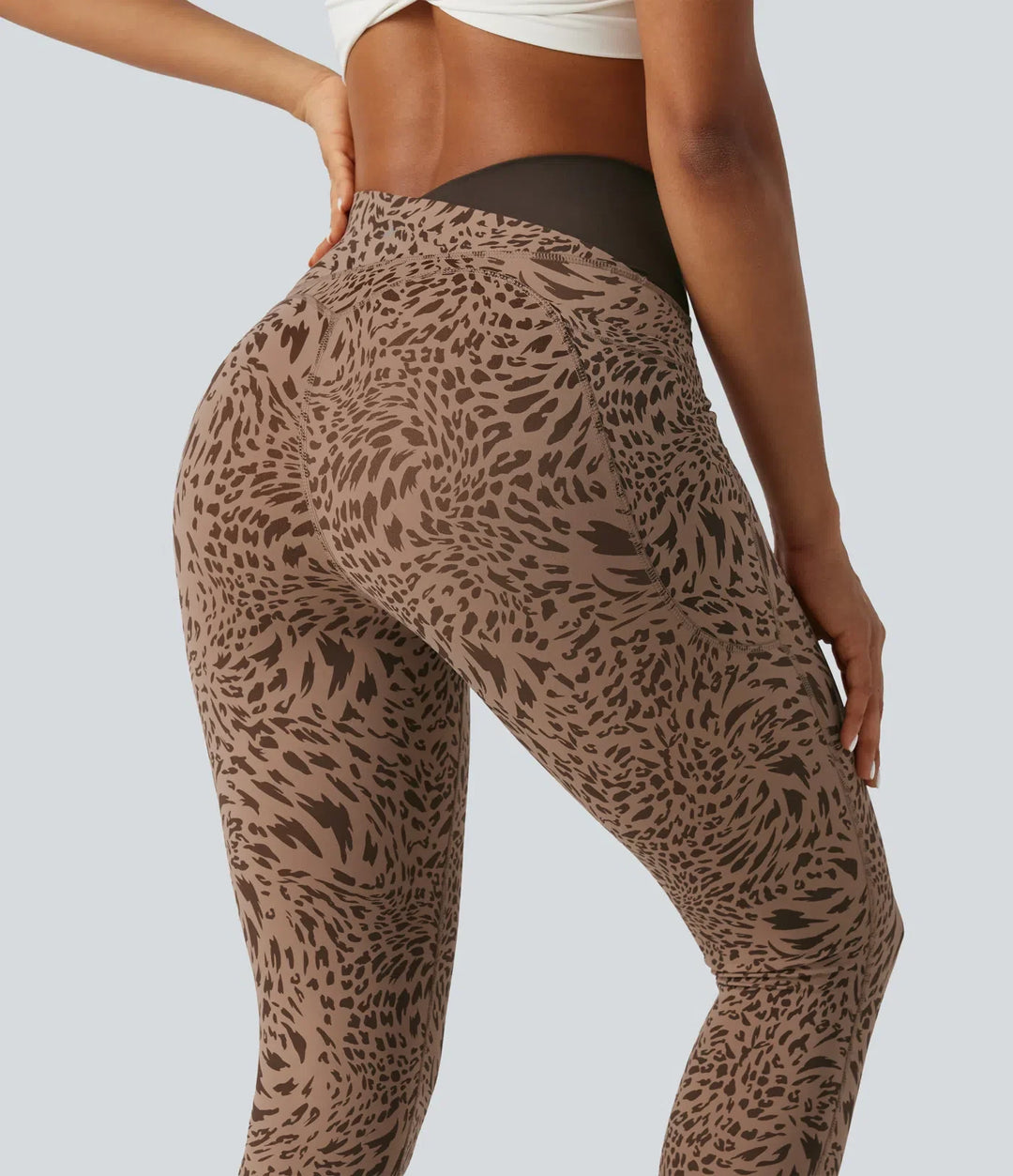 Milejka UltraSculpt w panterkę z wysokim stanem krzyżowany skinny legginsy do jogi z kieszeniami