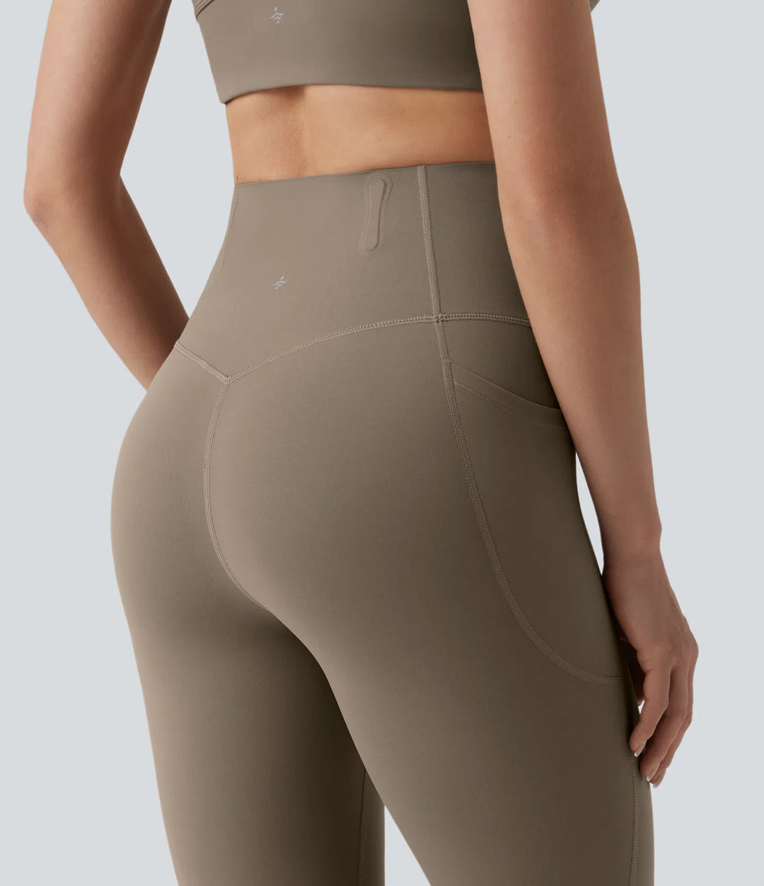 Halara UltraSculpt legginsy do jogi 7/8 z wysokim stanem, modelowaniem i kontrolą brzucha, pasem zapobiegającym podwijaniu oraz kieszeniami