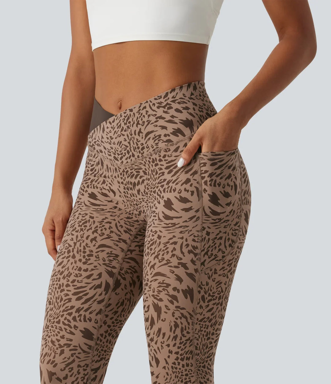 Milejka UltraSculpt w panterkę z wysokim stanem krzyżowany skinny legginsy do jogi z kieszeniami