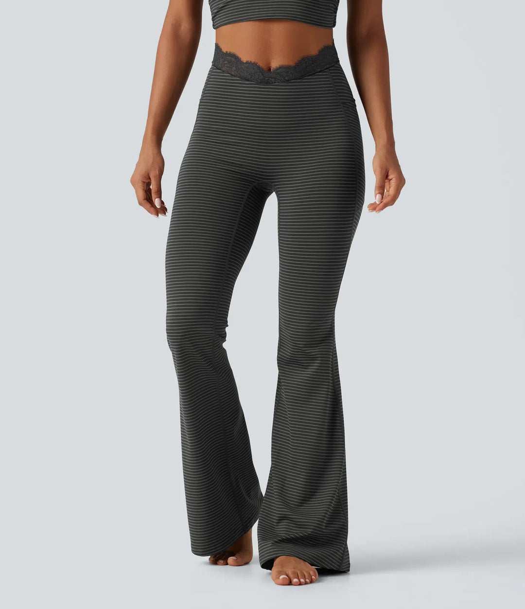 V-Shaped z wysokim stanem kontrastowa koronka w paski joga legginsy flare z kieszeniami