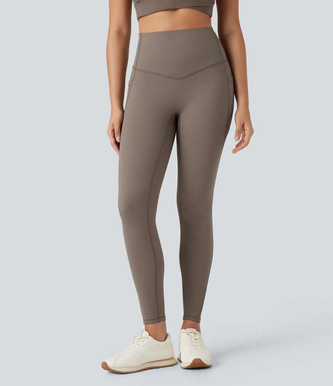 SoCinched legginsy do jogi z polaru z wysokim stanem, modelujące brzuch, z kieszeniami.