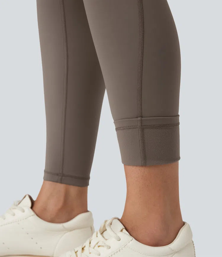 SoCinched legginsy do jogi z polaru z wysokim stanem, modelujące brzuch, z kieszeniami.