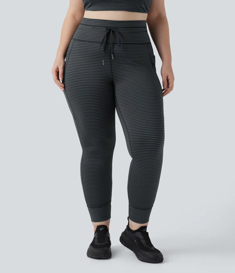 Legginsy do jogi w paski z wysokim stanem, wiązaniem na sznurek i kieszeniami — rozmiar plus