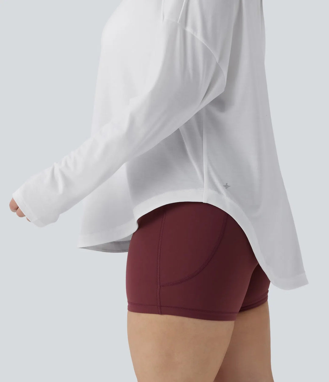 Na jedno ramię z długim rękawem z otworem na kciuk z zaokrąglonym dołem High Low szybkoschnący joga plus size top sportowy-z wbudowanym biustonoszem