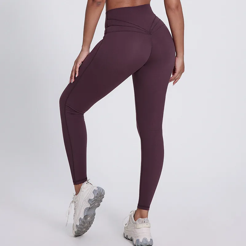 SoftlyZero legginsy do jogi z wysokim stanem, krzyżowanym pasem, kontrastową koronką i kieszeniami
