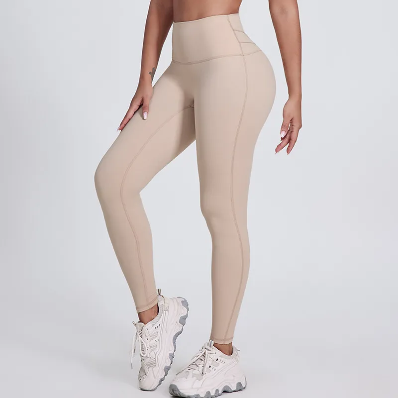 SoftlyZero legginsy do jogi z wysokim stanem, krzyżowanym pasem, kontrastową koronką i kieszeniami