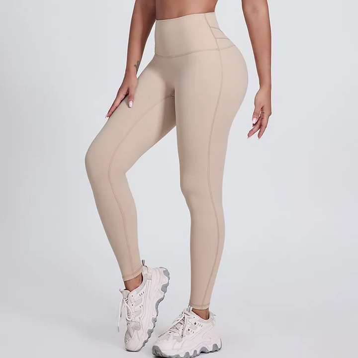 SoftlyZero legginsy do jogi z wysokim stanem, krzyżowanym pasem, kontrastową koronką i kieszeniami