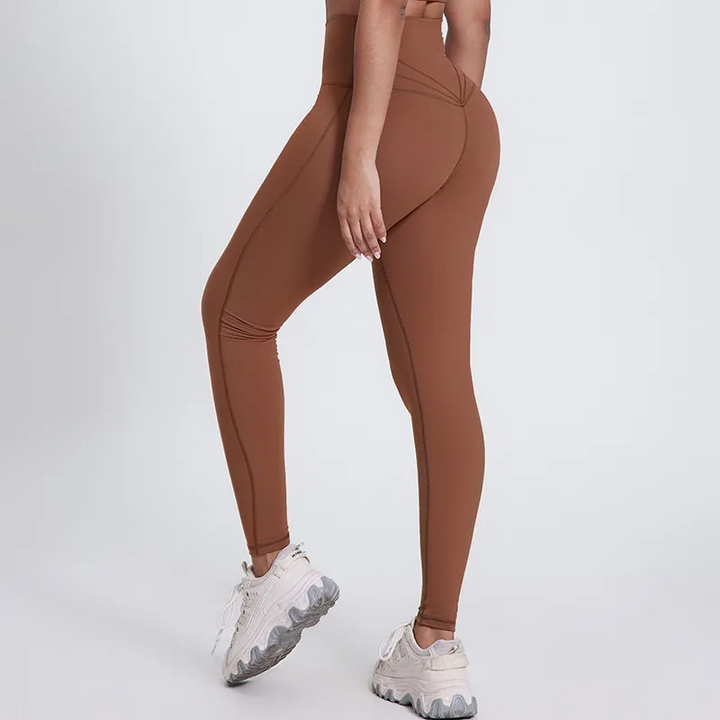 SoftlyZero legginsy do jogi z wysokim stanem, krzyżowanym pasem, kontrastową koronką i kieszeniami