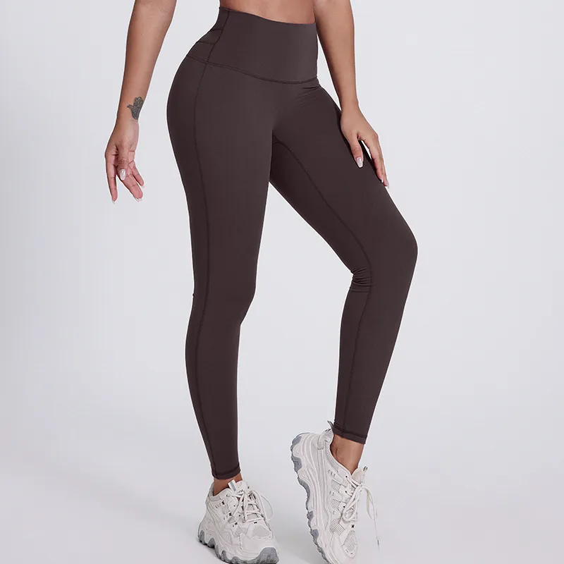 SoftlyZero legginsy do jogi z wysokim stanem, krzyżowanym pasem, kontrastową koronką i kieszeniami