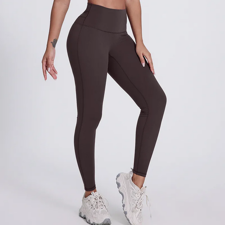 SoftlyZero legginsy do jogi z wysokim stanem, krzyżowanym pasem, kontrastową koronką i kieszeniami